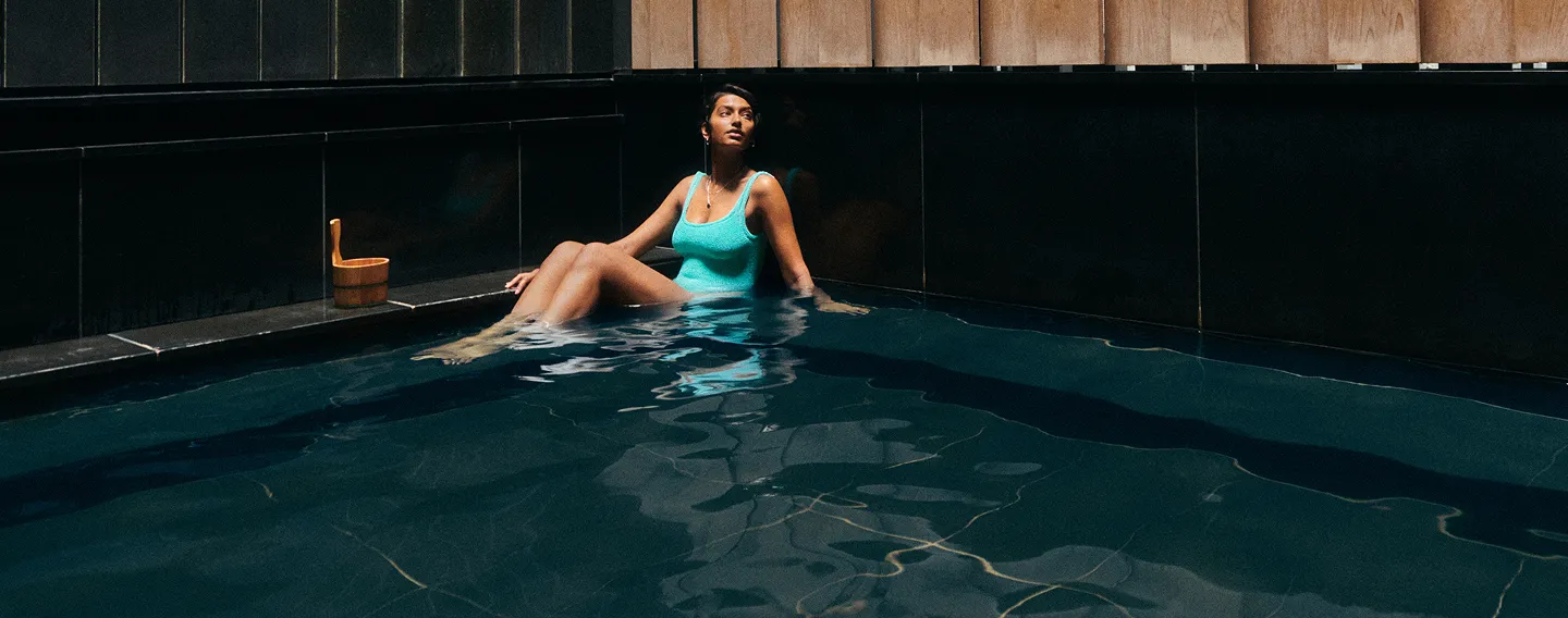 Lady relaxing on pool